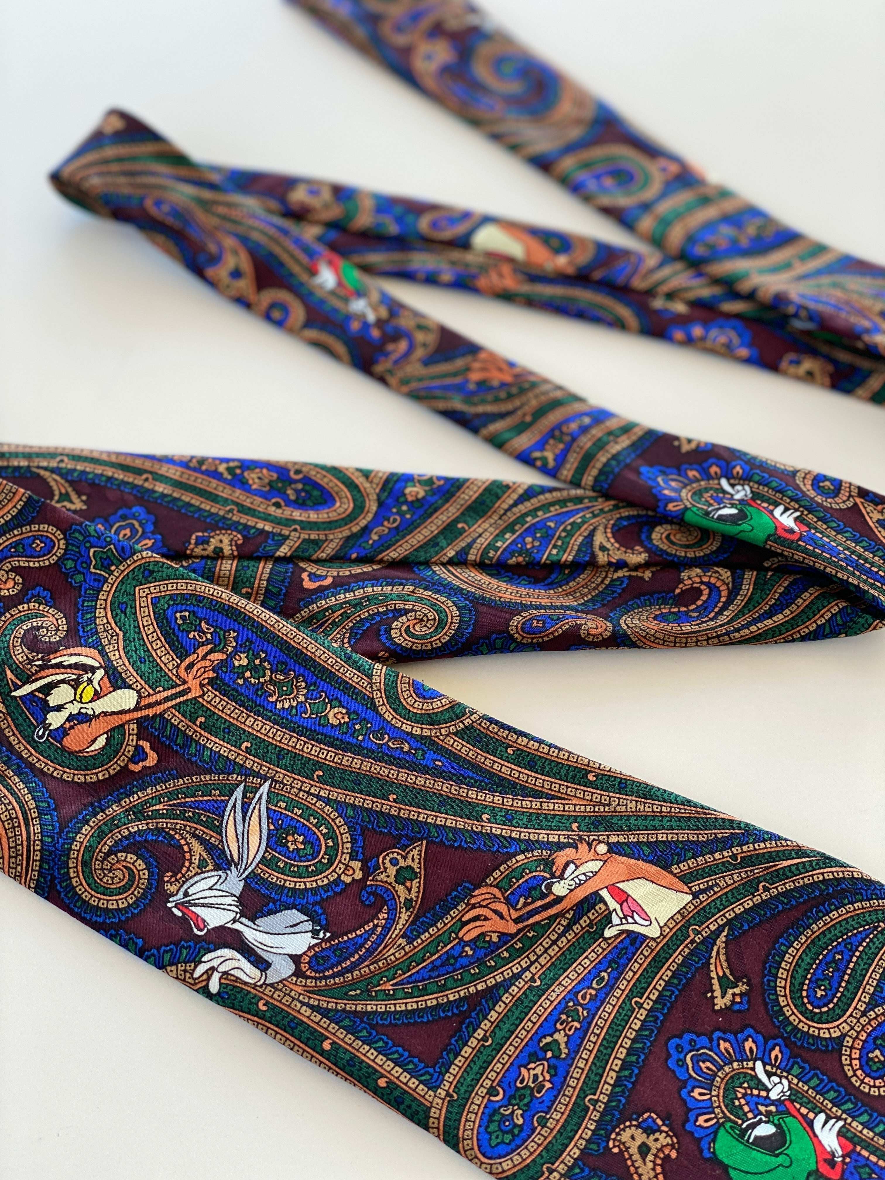 Vintage Looney Tunes paisley necktie with Bugs Bunny, Taz, and Marvin the Martian on rich blue, green, and burgundy silk.