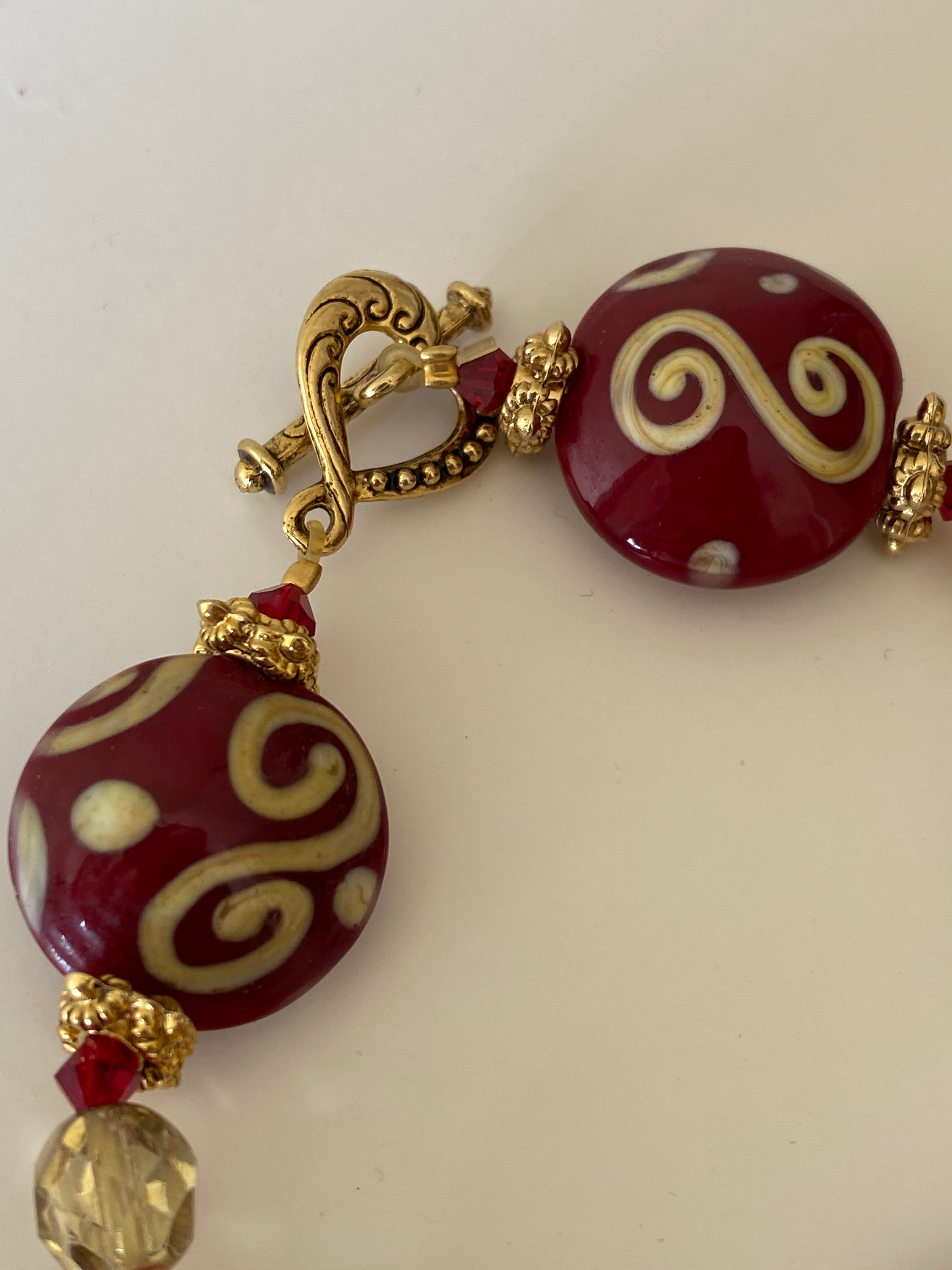 Vintage Lampwork Glass Bead Bracelet Red Swirl Beads with Gold-Tone Toggle Clasp