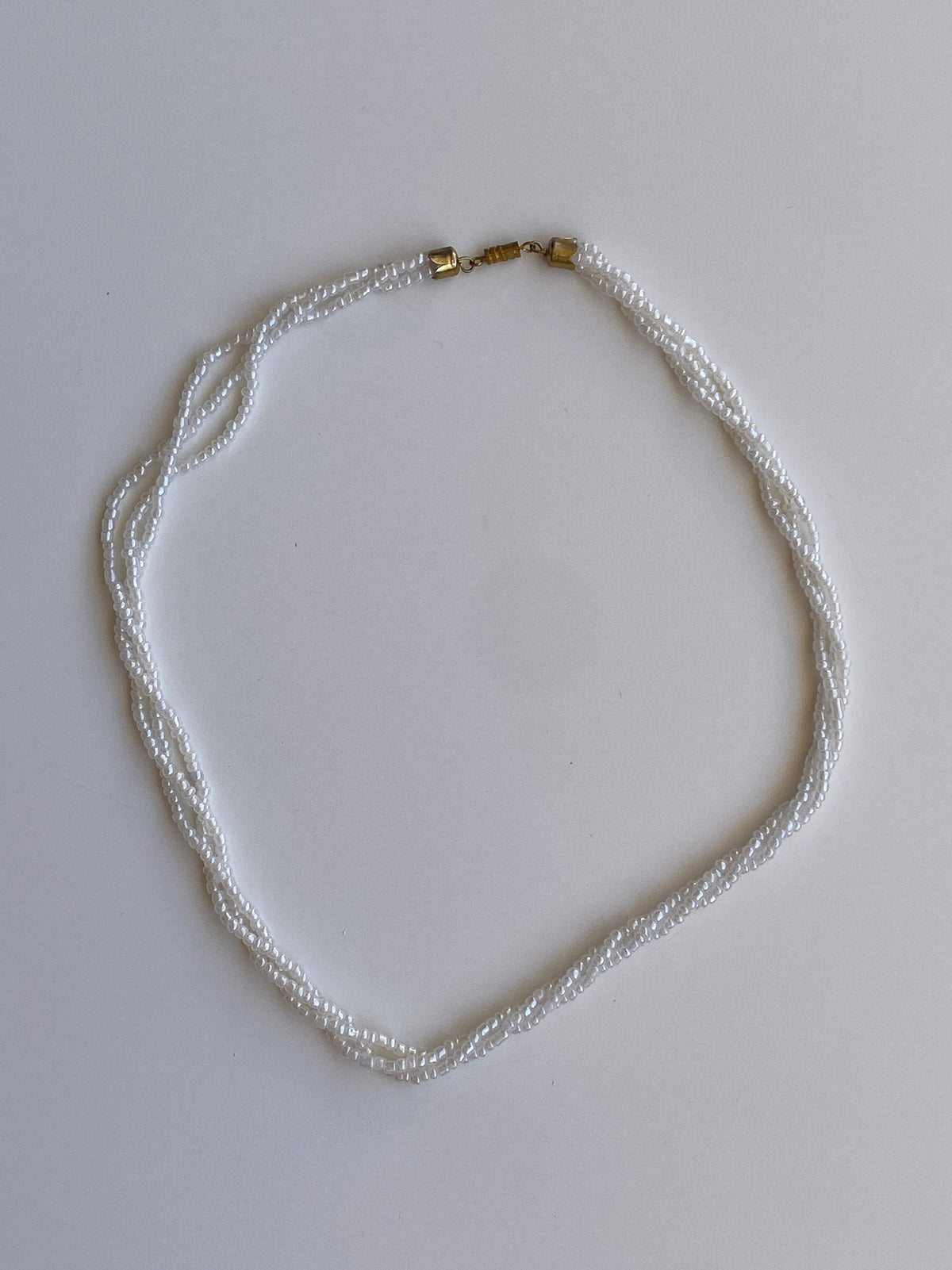 Vintage 90s/Y2K White Iridescent Seed Bead Triple-Strand Necklace with Gold-Tone Clasp