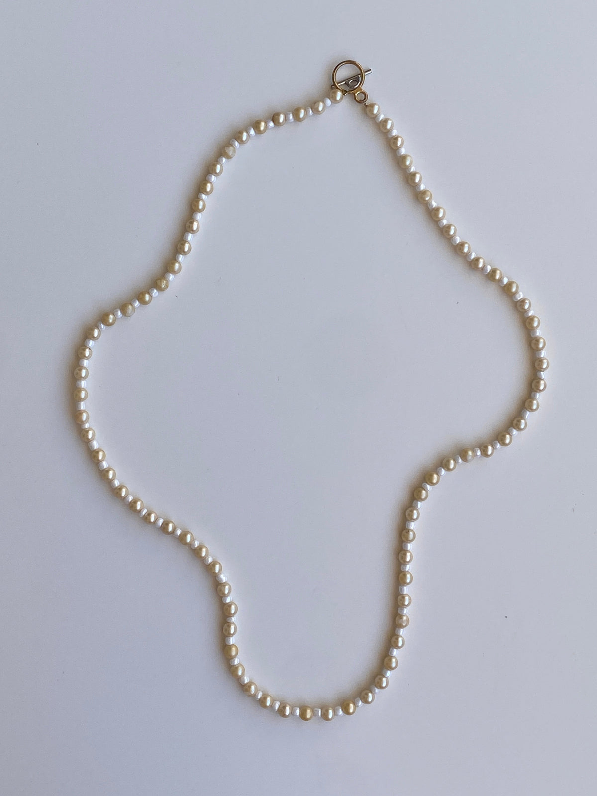 Vintage Y2K Cream & White Faux Pearl Long Strand Necklace with Gold-Tone Toggle Clasp