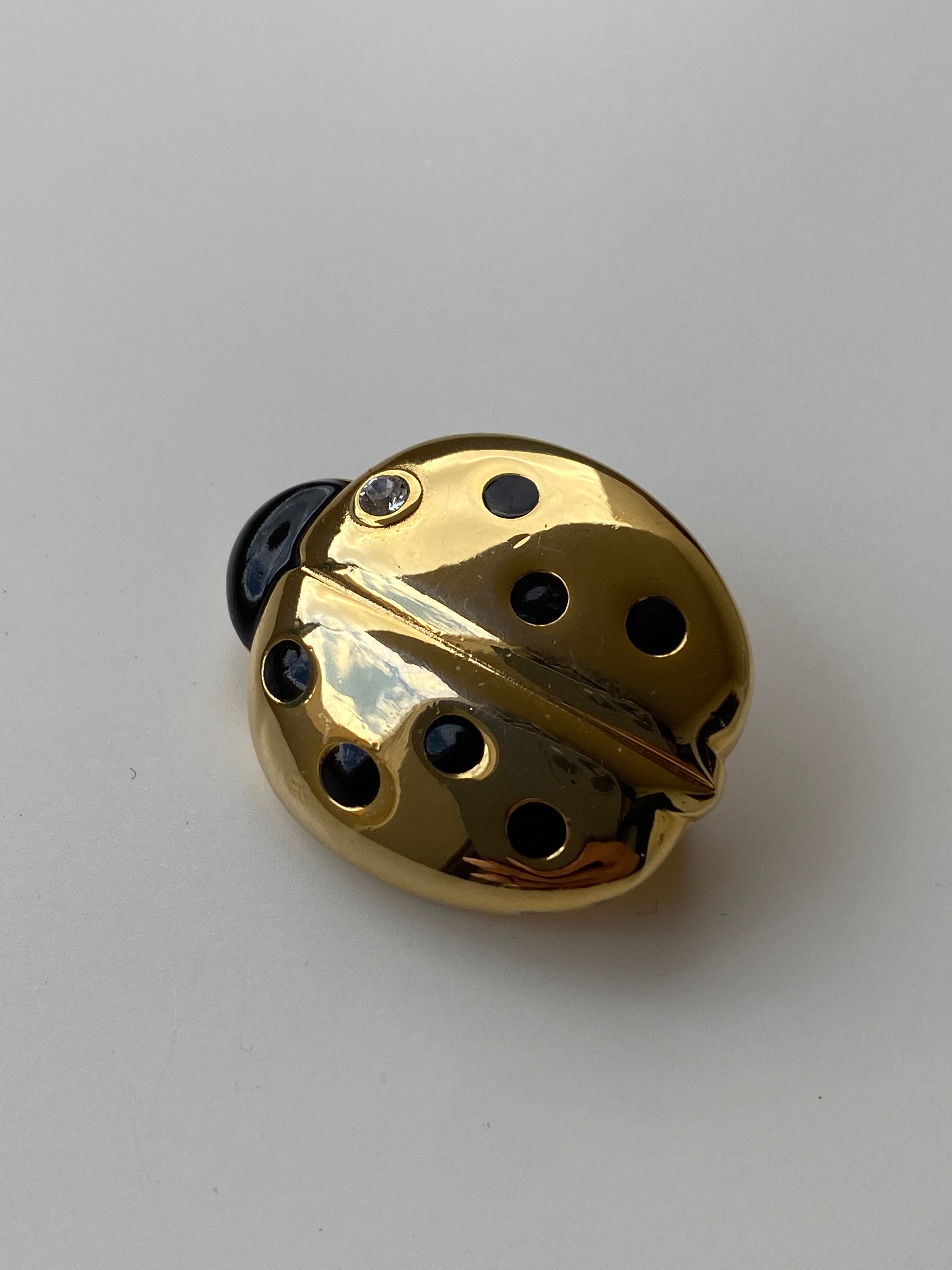 Vintage 80s–90s Gold Tone Black Enamel Ladybug Brooch with Crystal Accent
