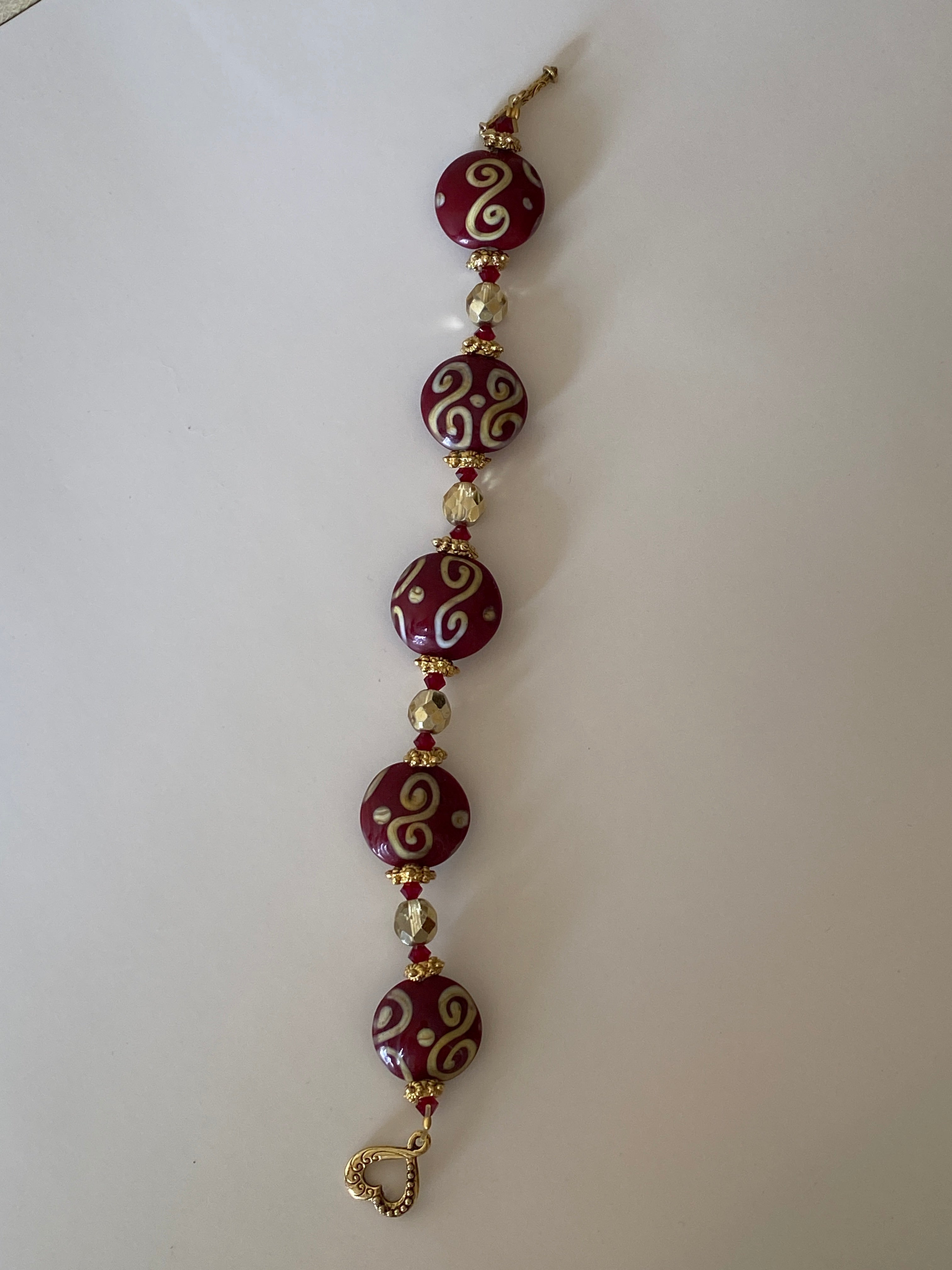 Vintage Lampwork Glass Bead Bracelet Red Swirl Beads with Gold-Tone Toggle Clasp