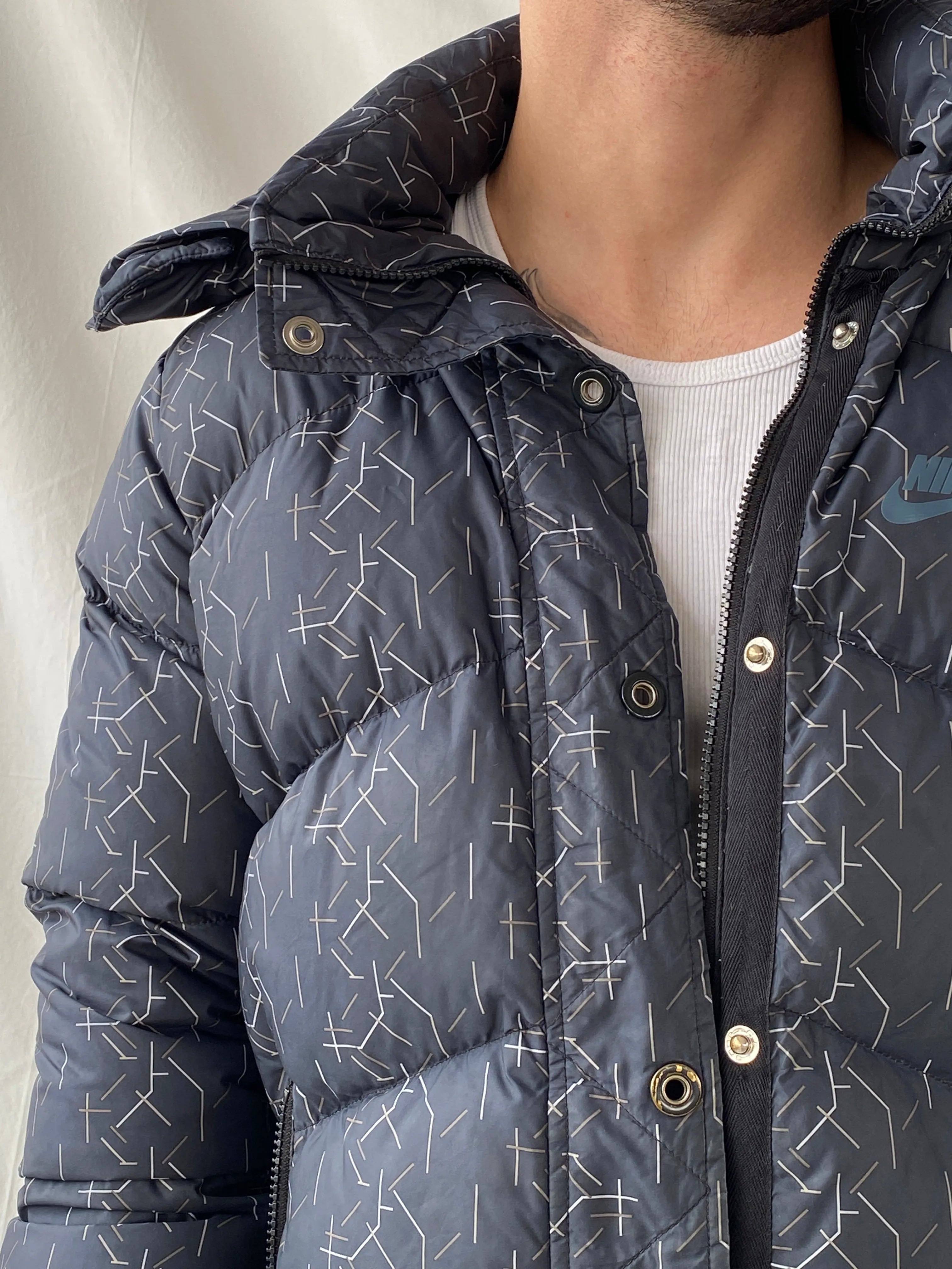 Nike Men’s Dark Grey Silver Lines Hooded Puffer Jacket - L - Balagan Vintage Jacket consignment, Hamza, jacket, Joe, Nike, puffer jacket