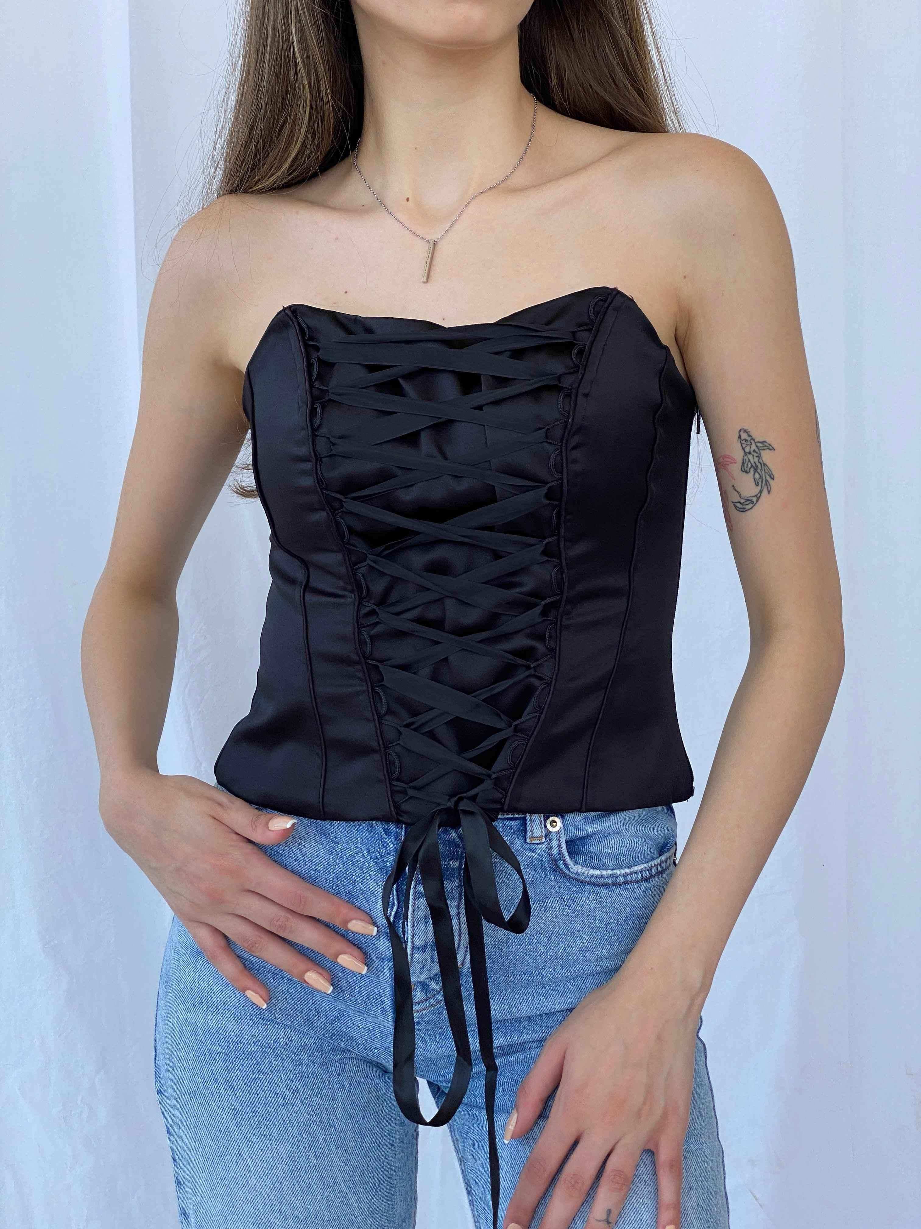 Vintage 90s black corset top with boned structure.