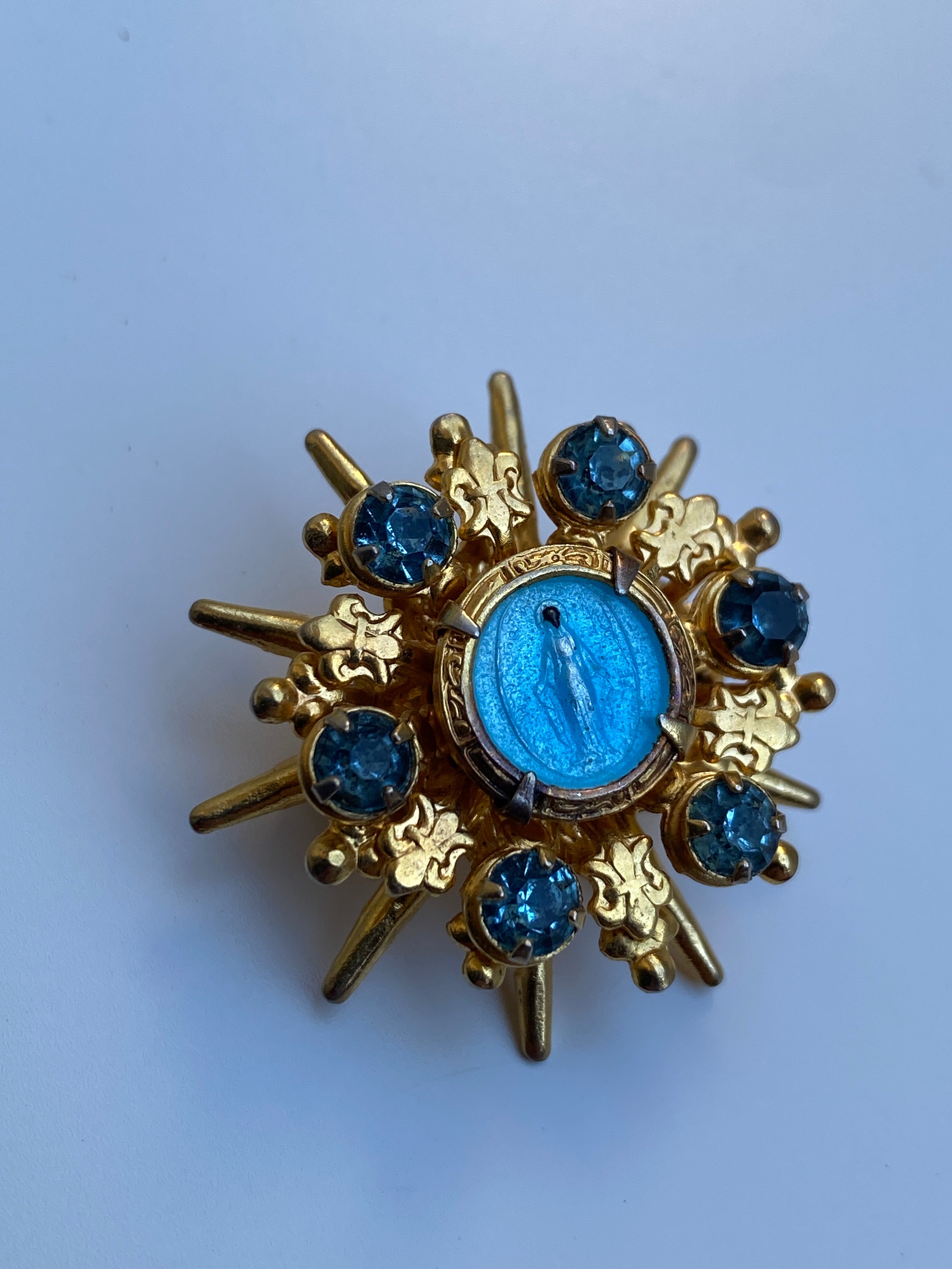 Vintage Mid-Century Gold Tone Blue Rhinestone Miraculous Medal Virgin Mary Starburst Brooch