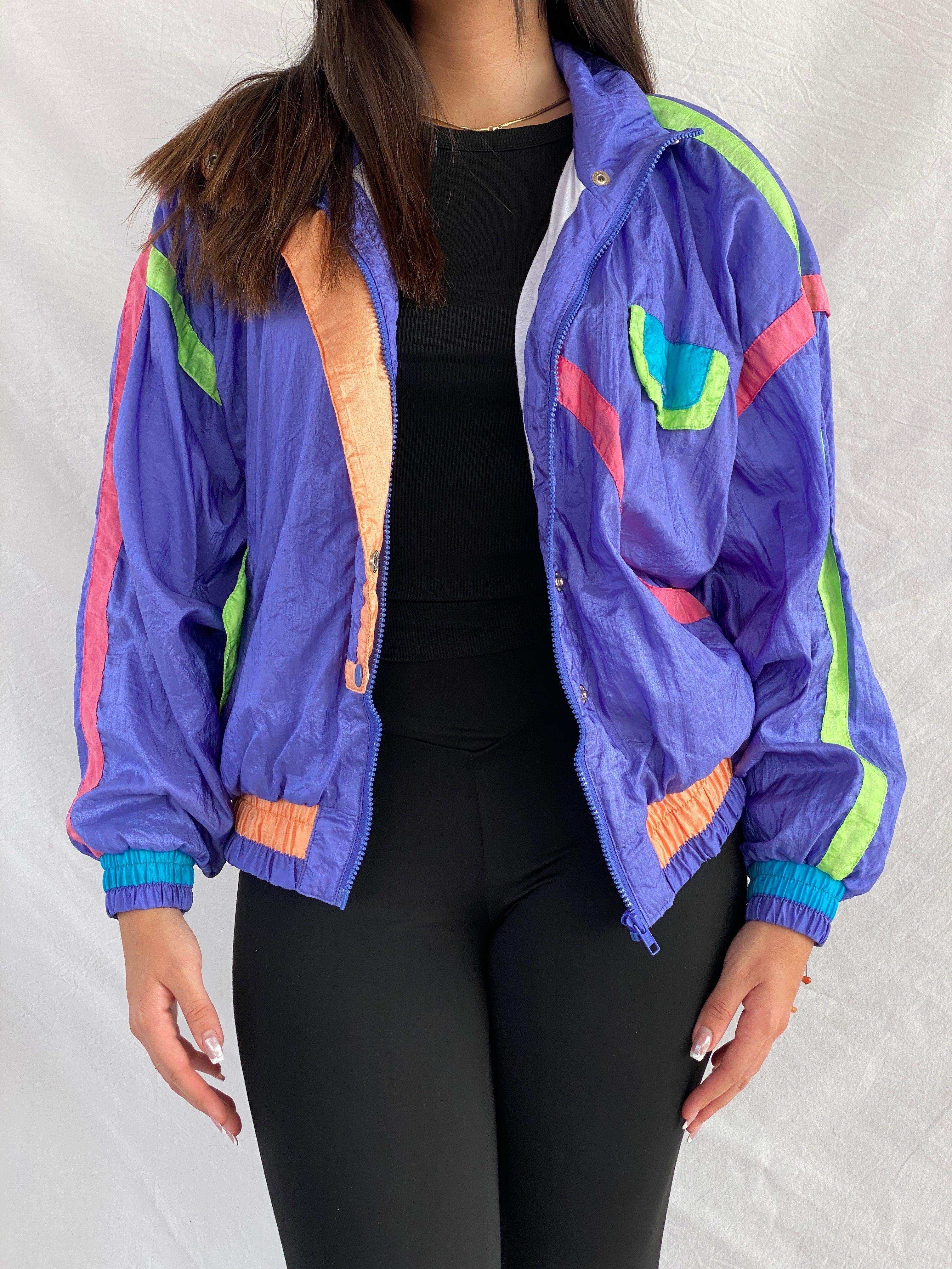 awesome 80s 90s windbreaker. a few small white marks