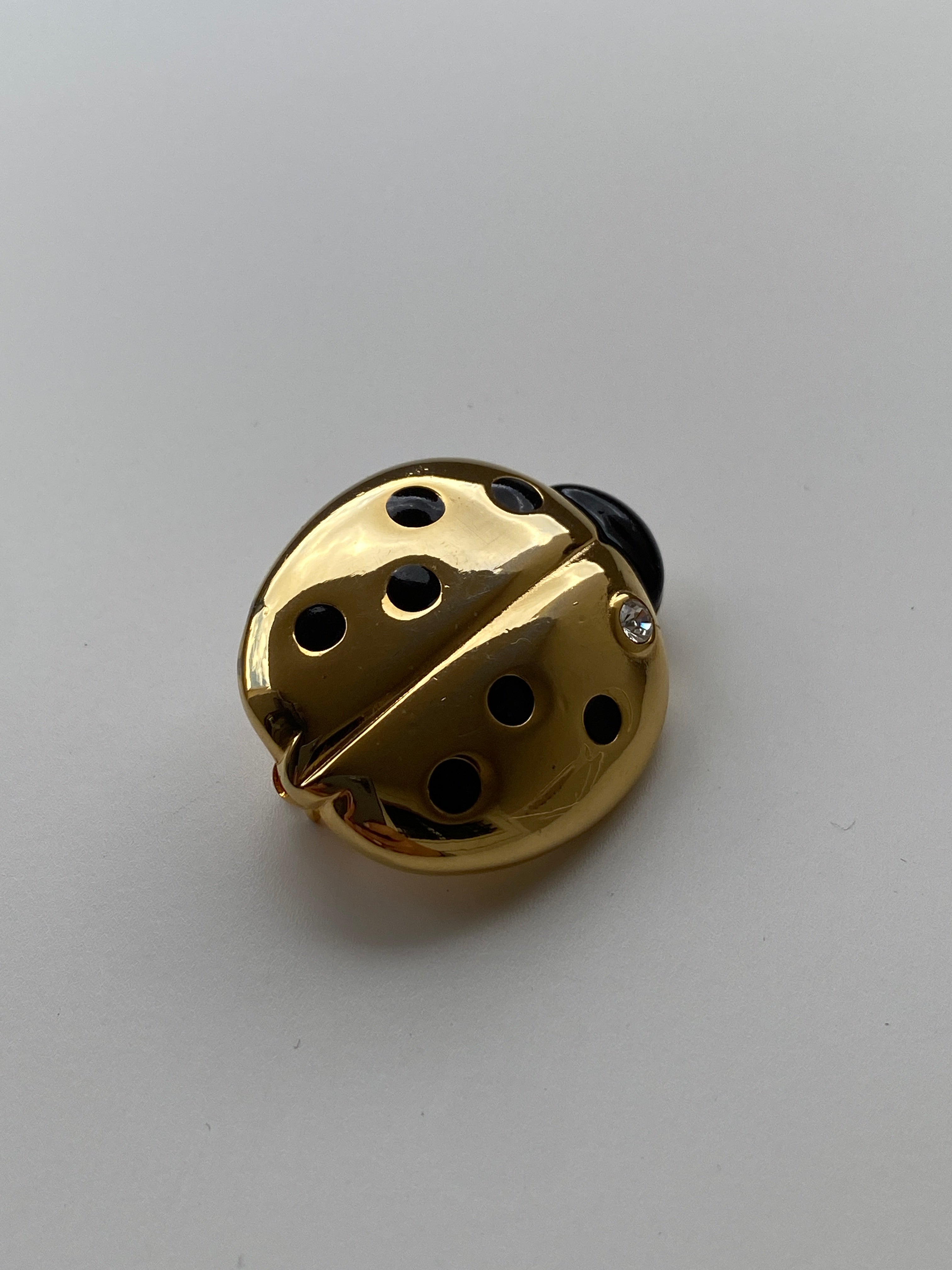 Vintage 80s–90s Gold Tone Black Enamel Ladybug Brooch with Crystal Accent