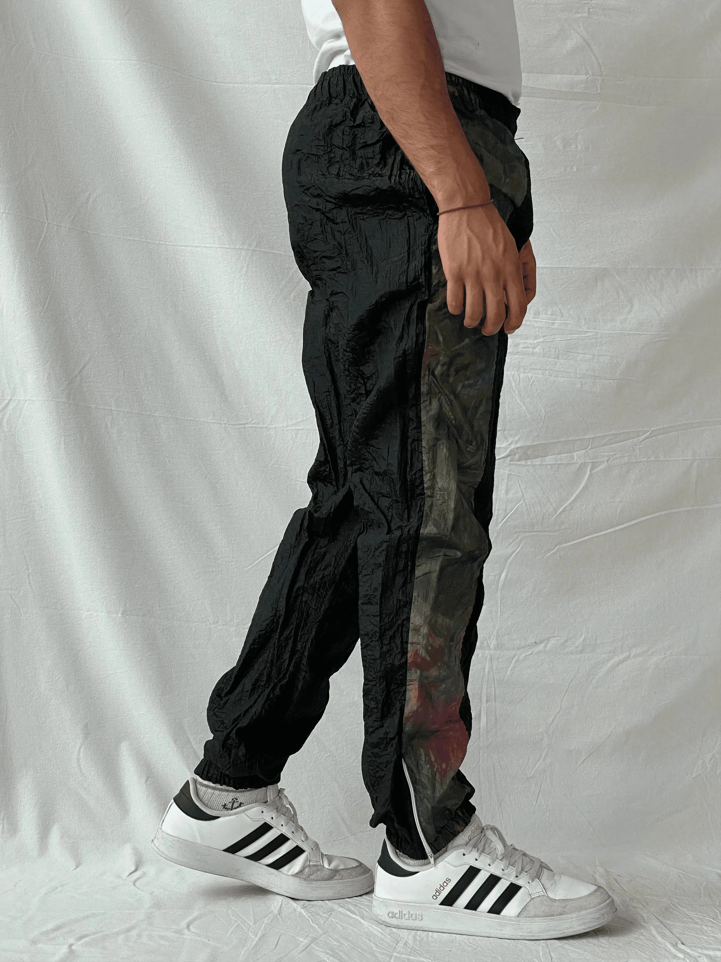 Vintage 80s/90s Sergio Tacchini Black Track Windbreaker Pants - L - Balagan Vintage Track Pants 80s, 90s, Ramez, vintage pants, windbreaker, winter