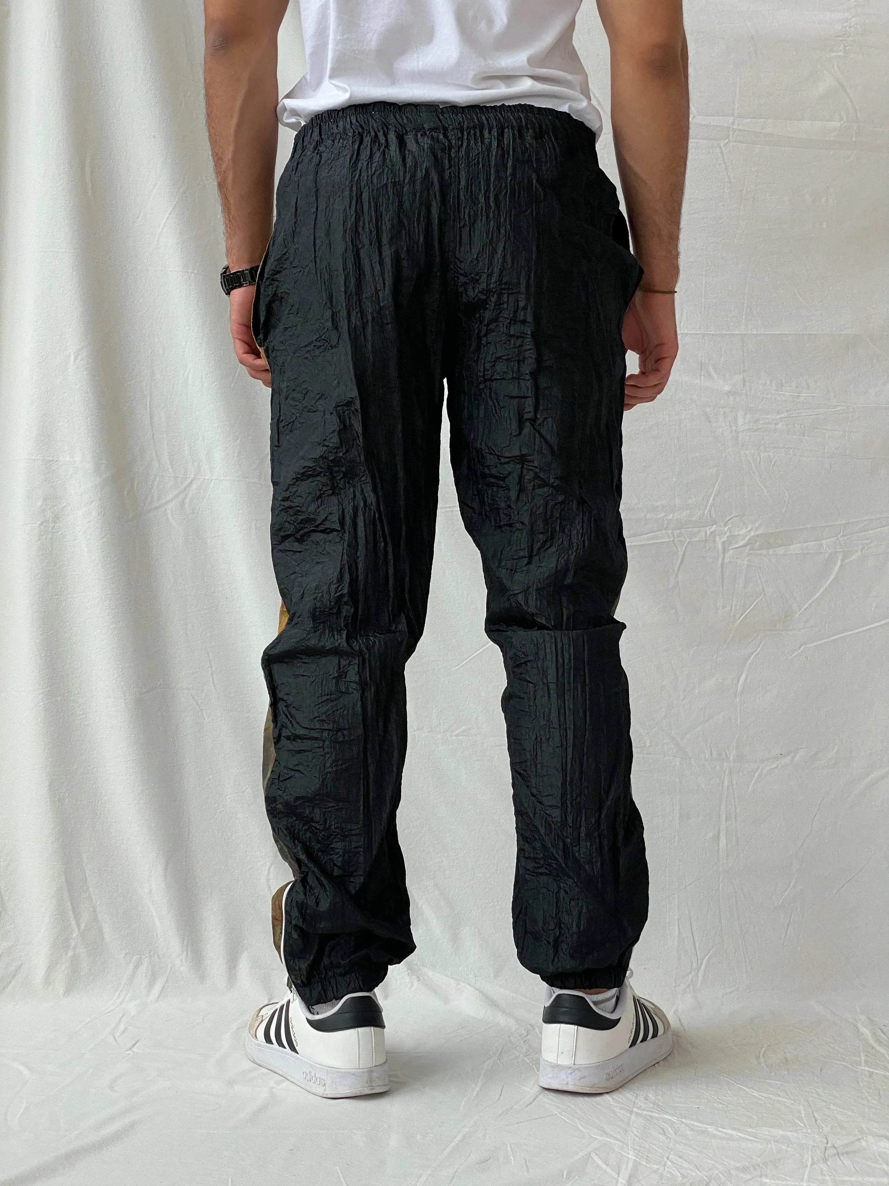 Vintage 80s/90s Sergio Tacchini Black Track Windbreaker Pants - L - Balagan Vintage Track Pants 80s, 90s, Ramez, vintage pants, windbreaker, winter